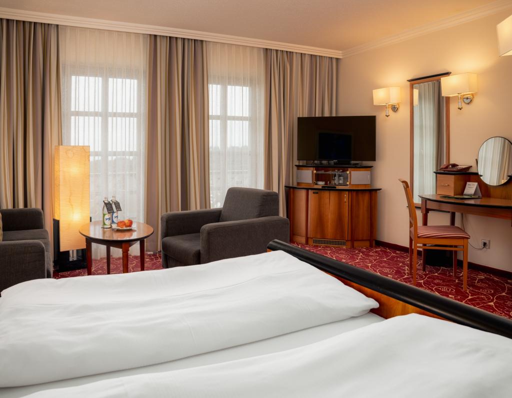 Gemütliches Zimmer im Sport- und Wellnesshotel Angerhof ****S mit Sitzbereich