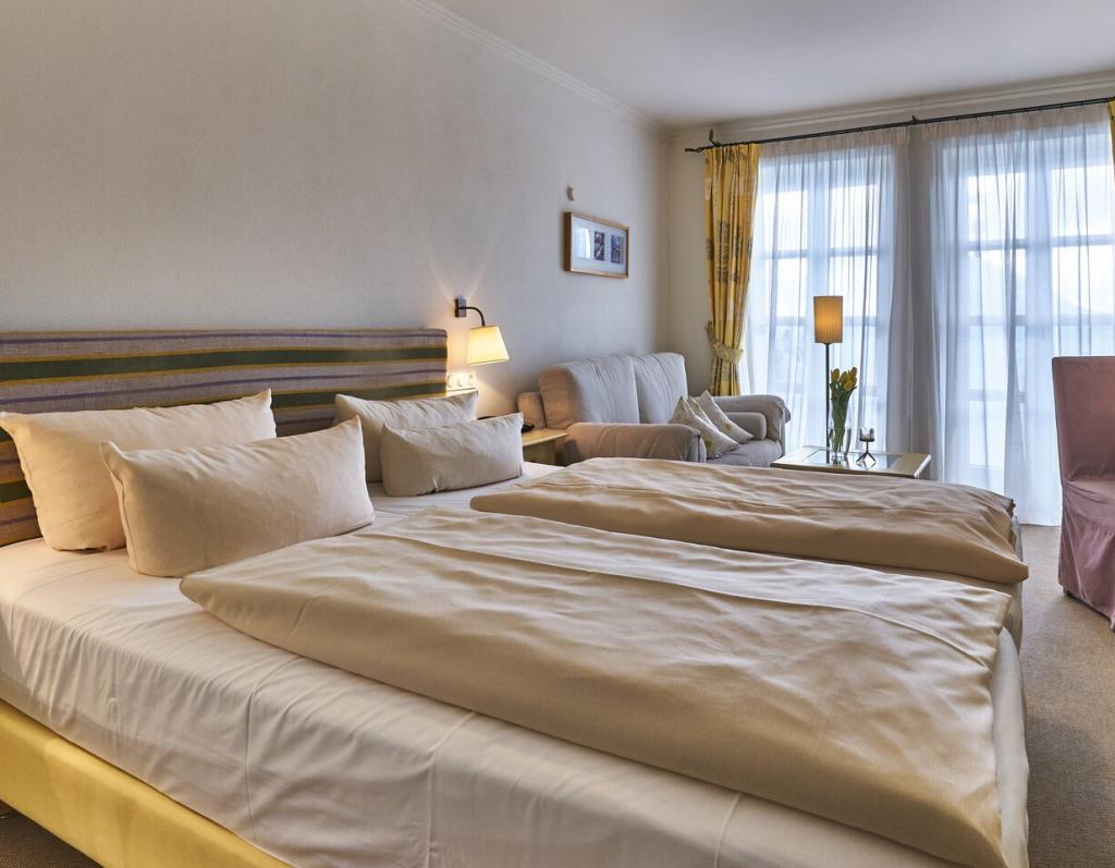 Gemütliches Doppelzimmer im Sport- und Wellnesshotel Angerhof ****S mit Balkon