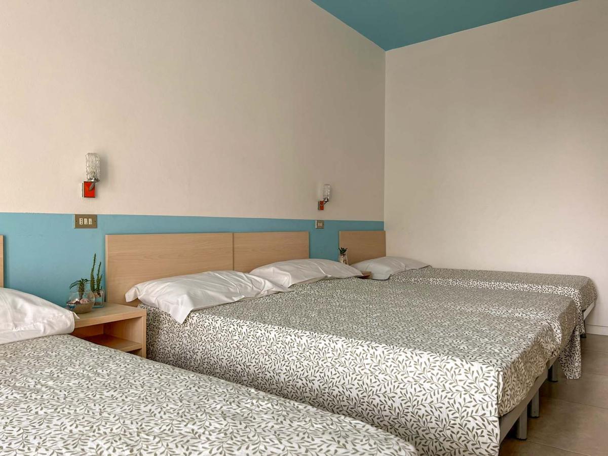 Camera tripla in Evangelisti Casa a Bellaria-Igea Marina con letti semplici