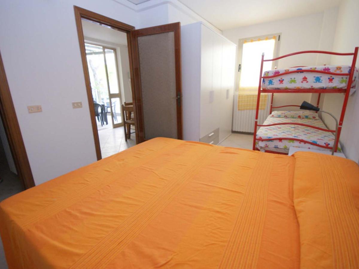 Camera con letto matrimoniale e letto a castello in Evangelisti Casa | Bellaria-Igea Marina