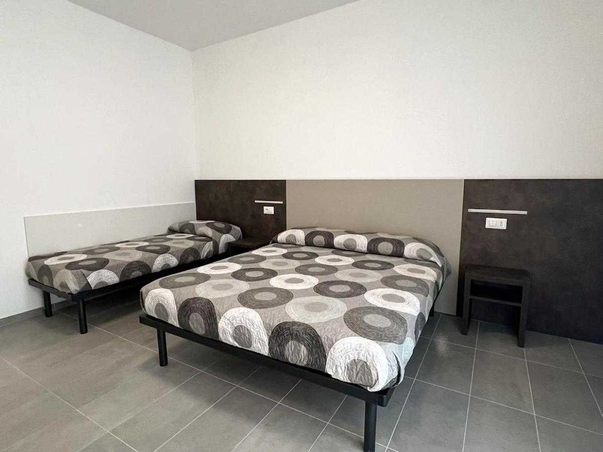 Camera da letto con due letti in Evangelisti Casa Bellaria-Igea Marina
