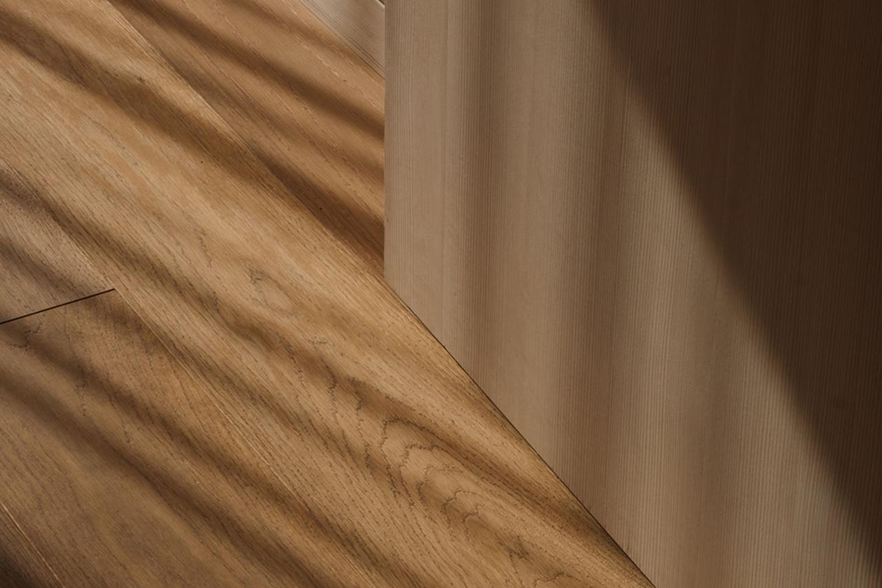 Wooden floor with shadows inside Hotel Aurora