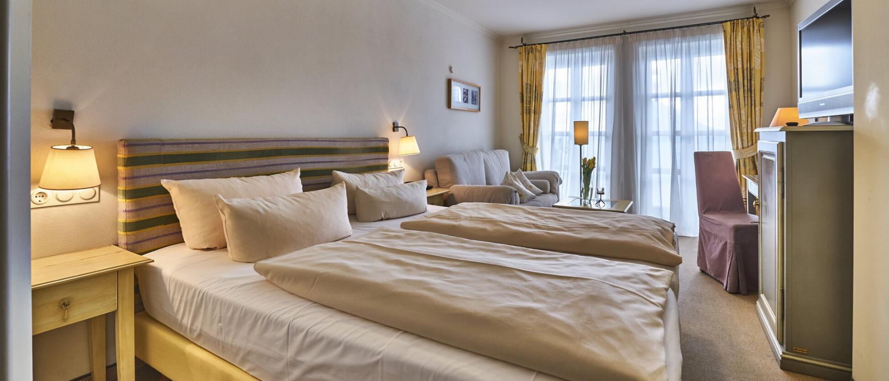 Gemütliches Doppelzimmer im Sport- und Wellnesshotel Angerhof ****S mit Balkon