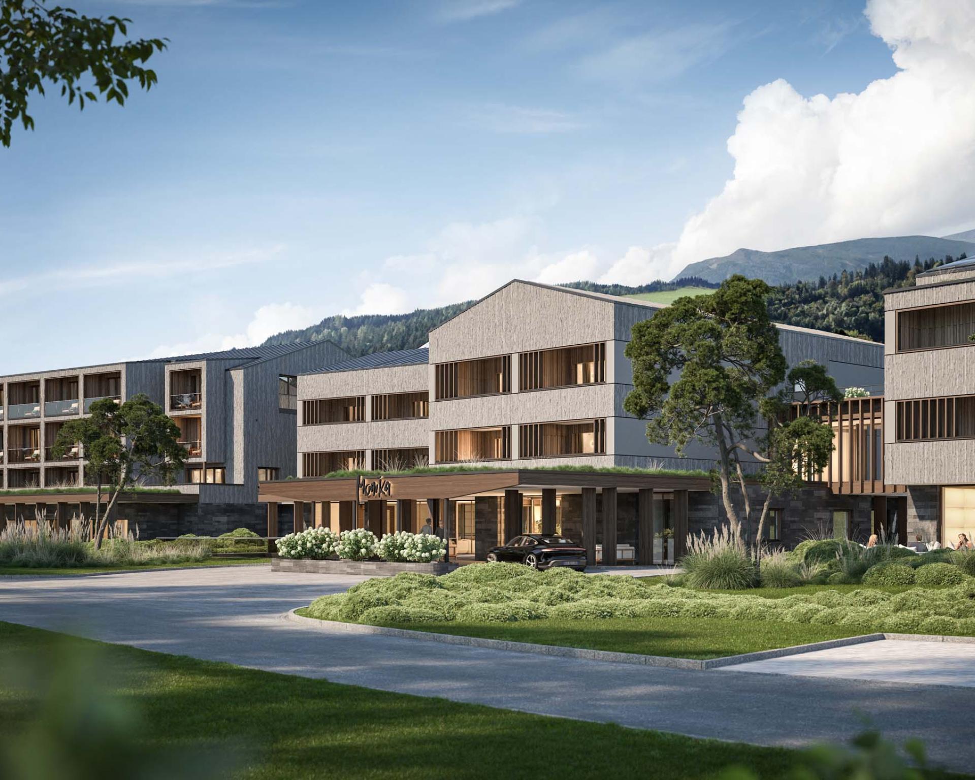 Hotel Monika in natürlicher Umgebung mit Bergen im Hintergrund
