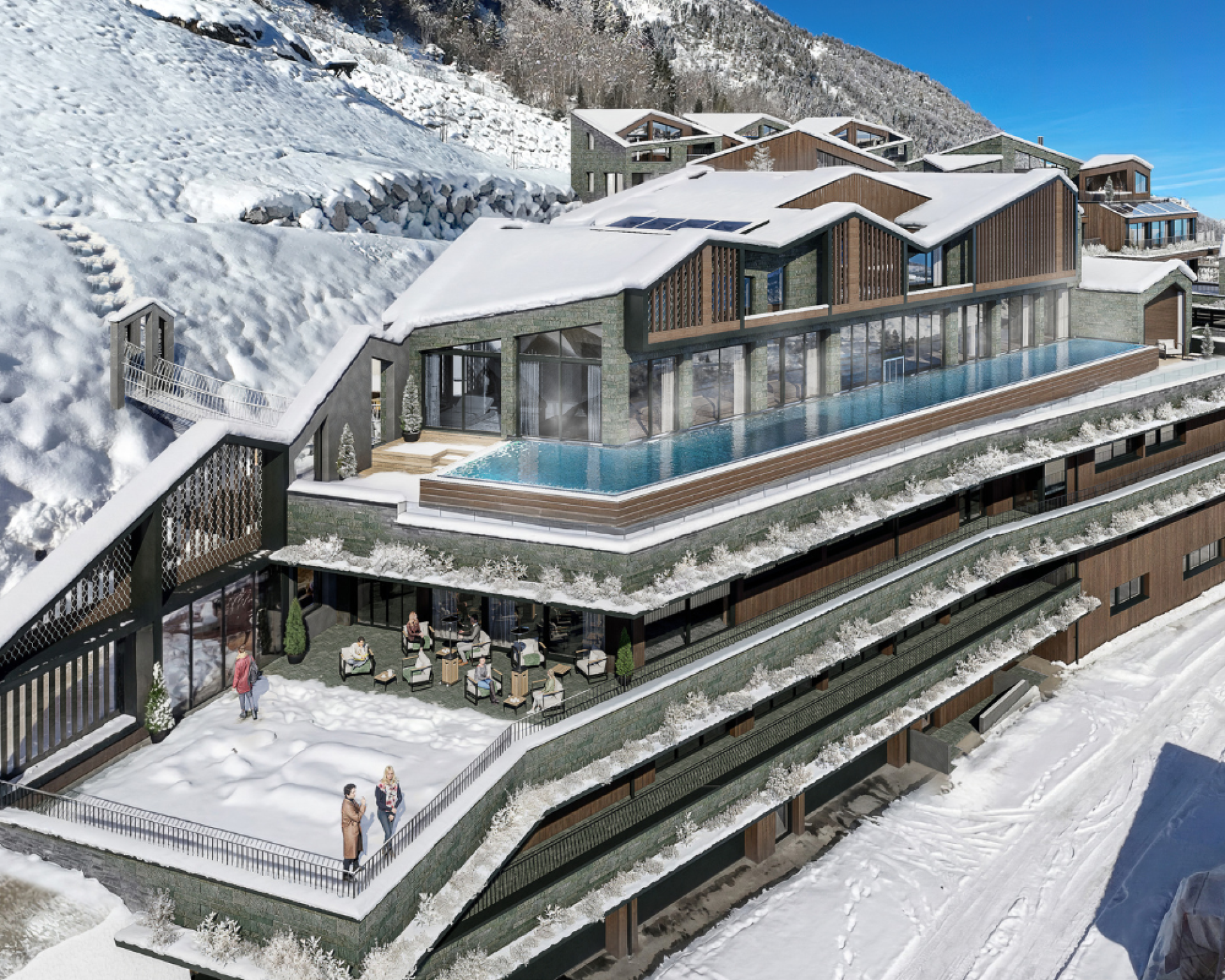 The modern architecture of the Designer Motel Glockna in Fusch am Großglockner, featuring an infinity pool on the roof terrace and the snow-capped Alps in the background.