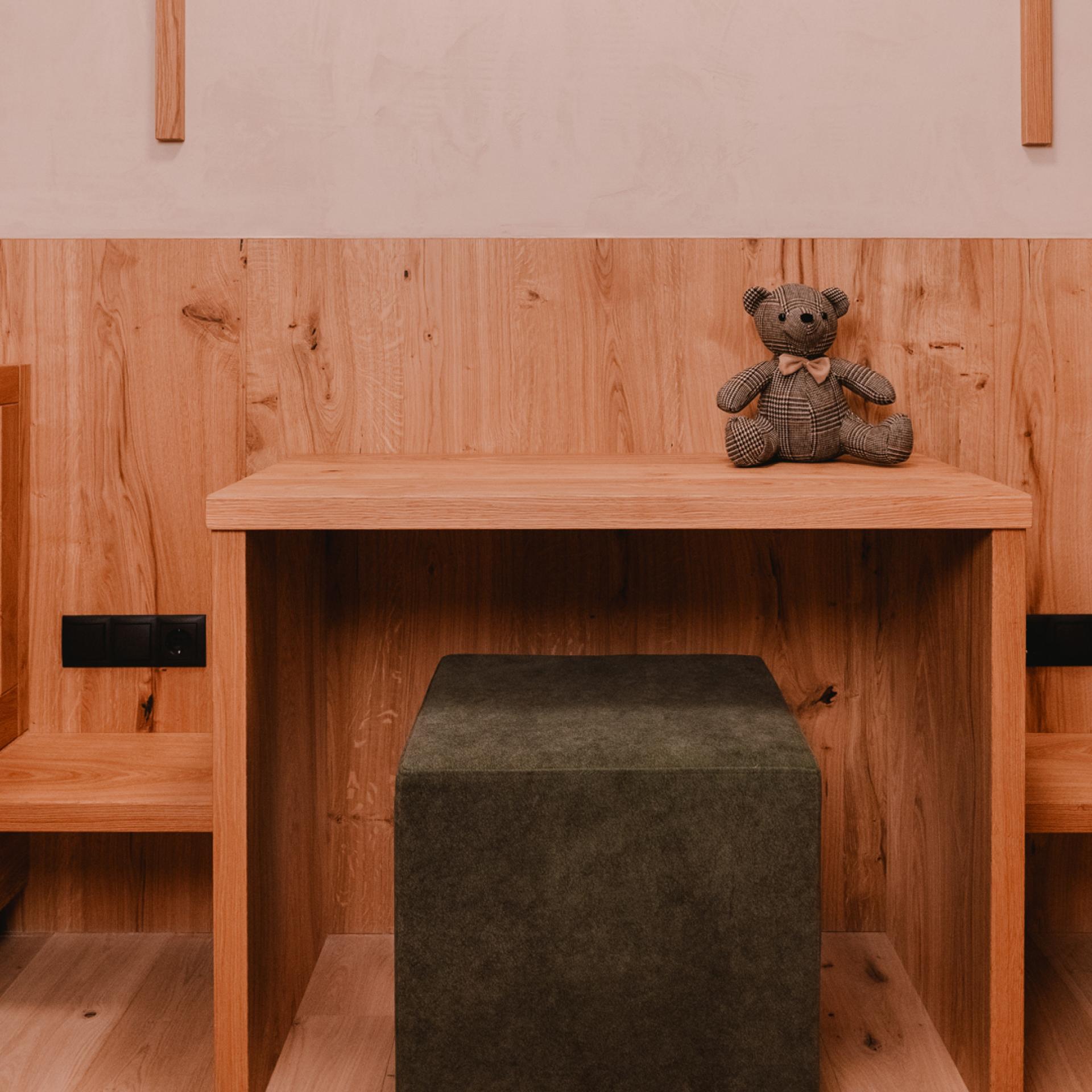 Spacious living and bedroom at Familienresort Buchau with wooden flooring