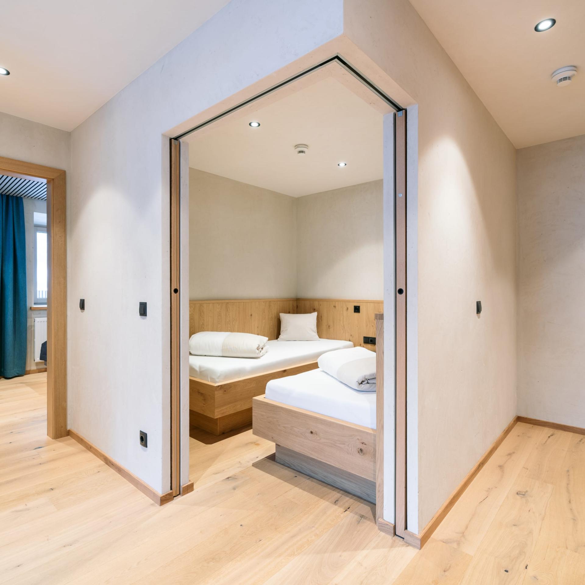 Bright hallway and bedroom in Familienresort Buchau