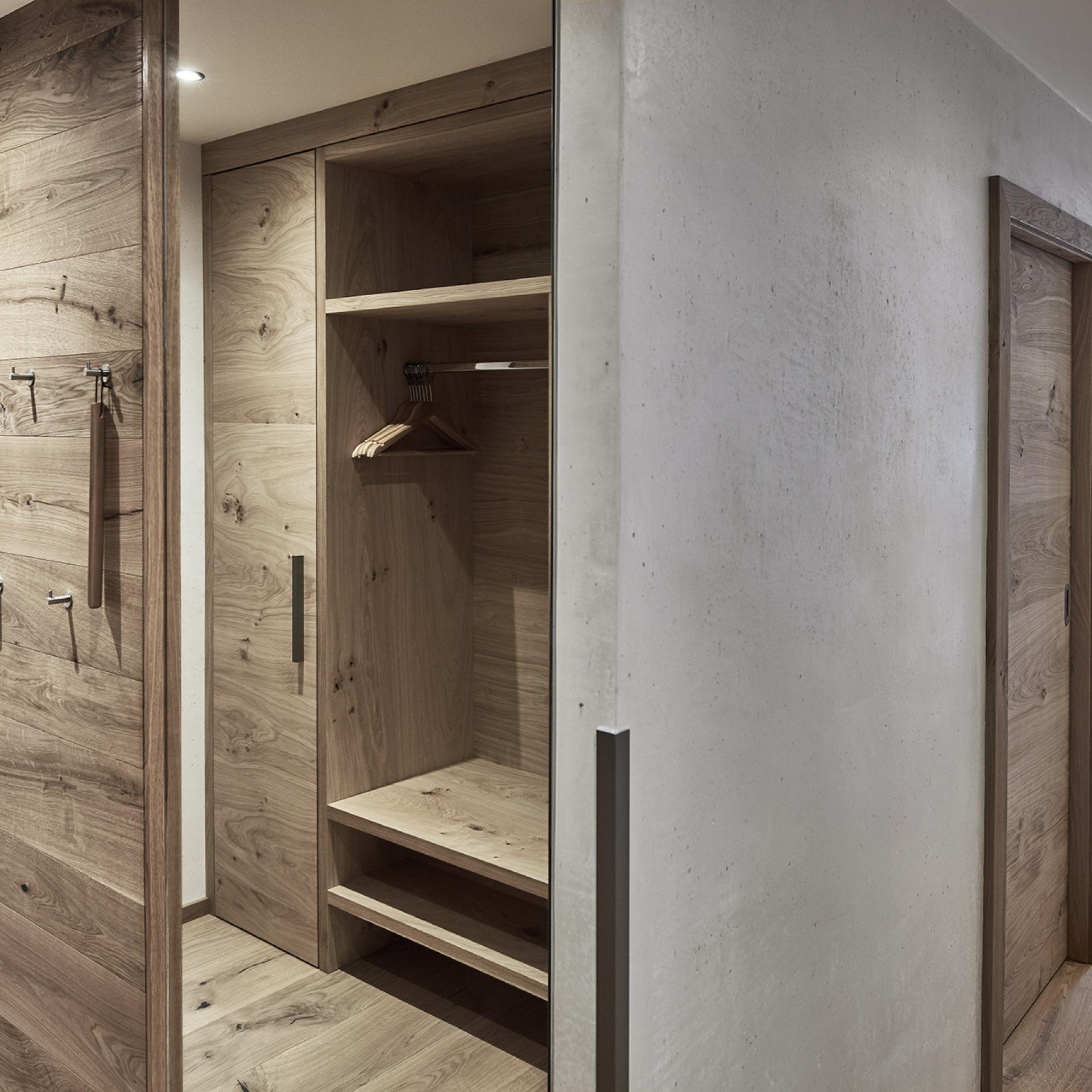 Modern hallway with wooden furniture at Familienresort Buchau