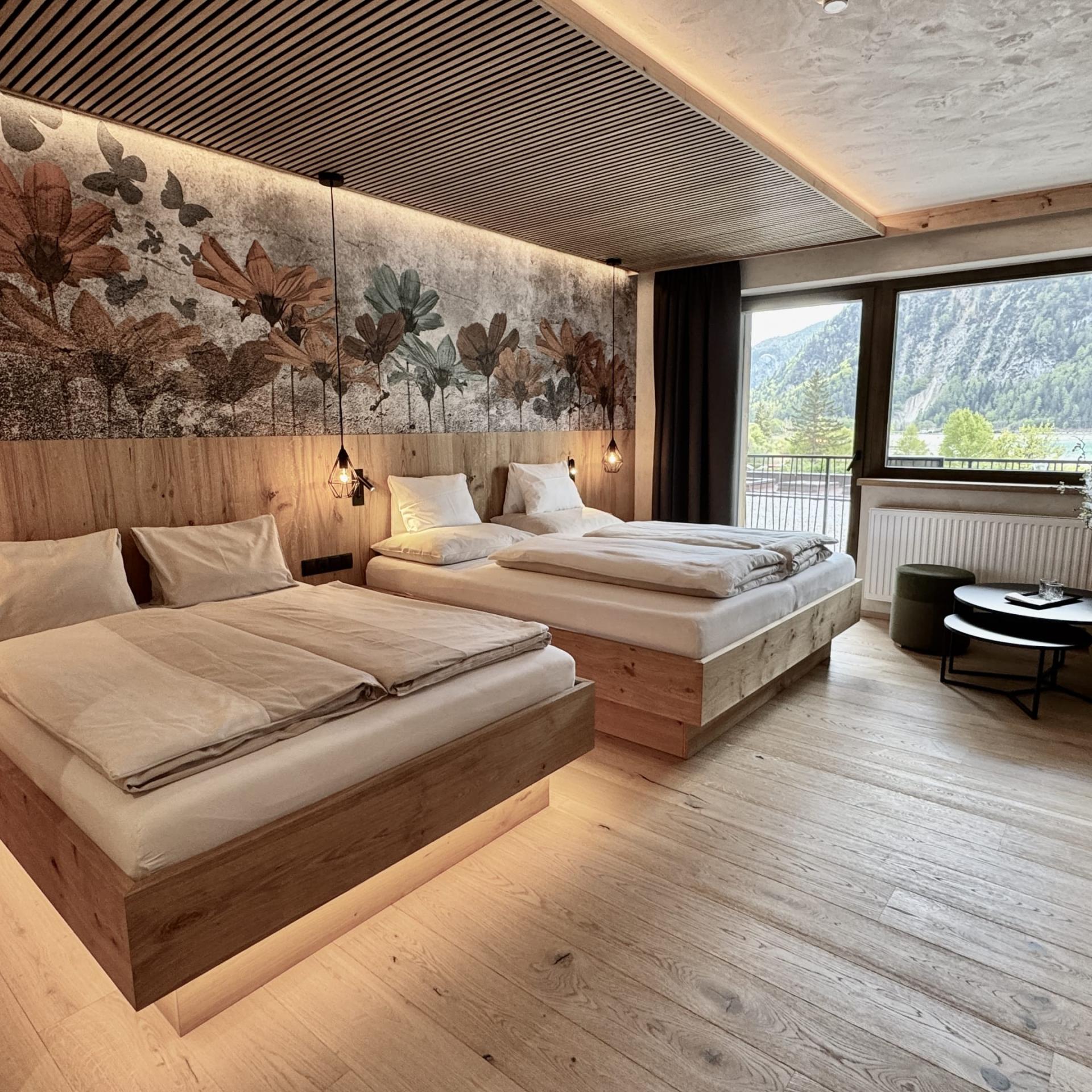 Modern double room at Familienresort Buchau with mountain view