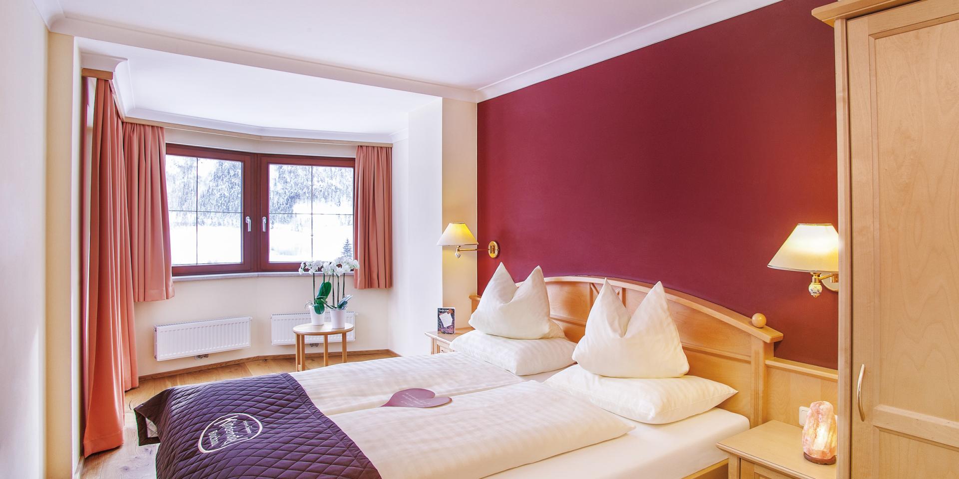 Cozy bedroom in Familienresort Buchau with double bed and window