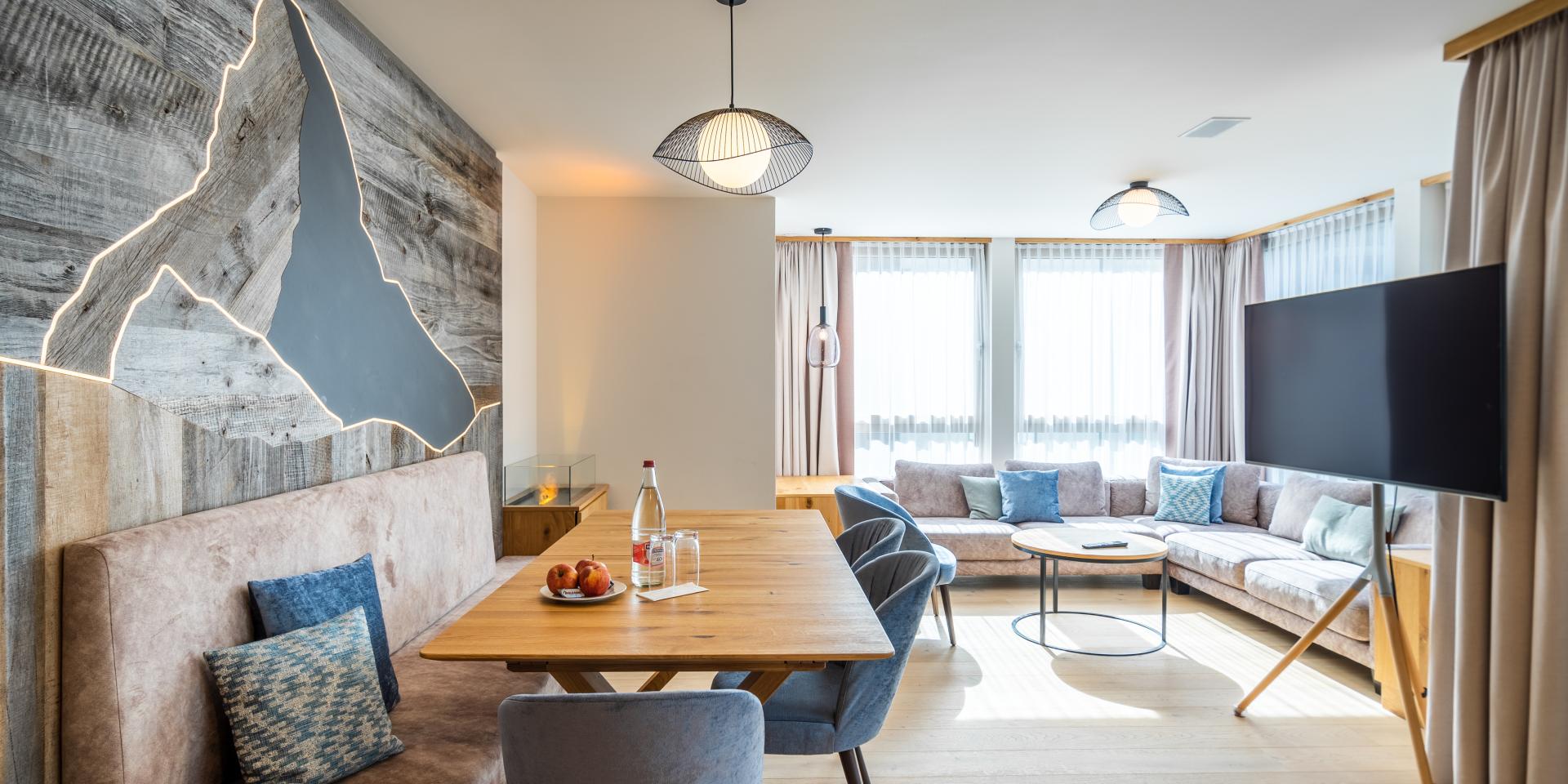 Espace salon et repas moderne dans le Resort La Ginabelle Zermatt