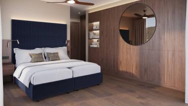 Modern bedroom with Krumers Alpin design, blue bed and round mirror