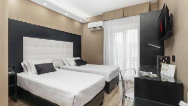 Camera con due letti singoli al Reggia Suite Spa Hotel