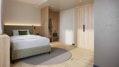 Modern single room with wooden furniture at Krumers Alpin