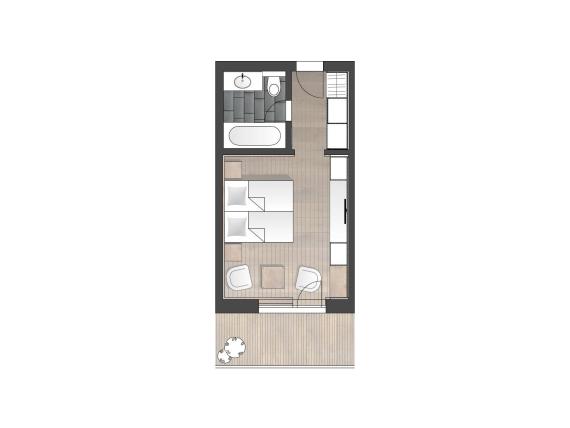 Hotel Panorama Zimmer mit Einzelbett, Sesseln, Tisch und großem Fenster