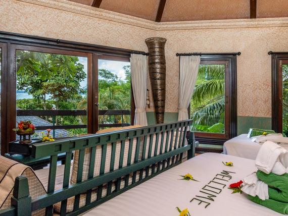 Mangosteen Deluxe villa with sitting area and terrace