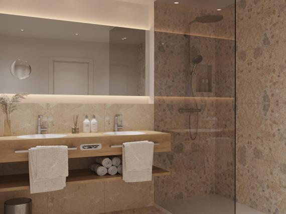 Modern bathroom with shower and double sink at Krumers Alpin