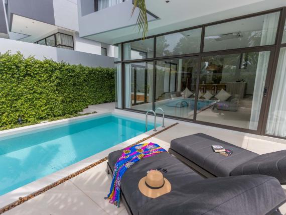 Private pool and lounge area at The Mangosteen Ayurveda & Wellness Resort