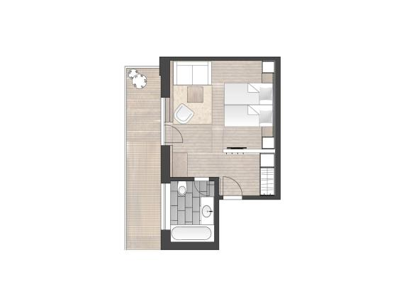 Hotel Panorama Doppelzimmer mit Bett, Sofa und Skifahrerbild