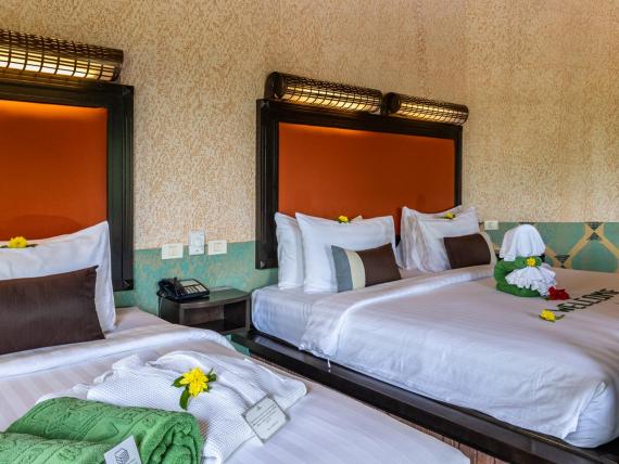 Triple configuration in the Deluxe Jacuzzi Villa at the Mangosteen Ayurveda & Wellness Resort