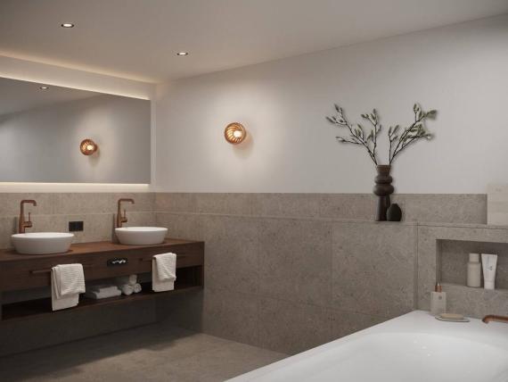 Modern bathroom at Krumers Alpin with double sinks and bathtub