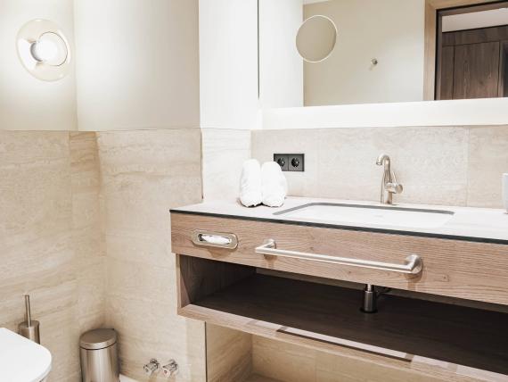 Krumers Alpin bathroom with sink and mirror