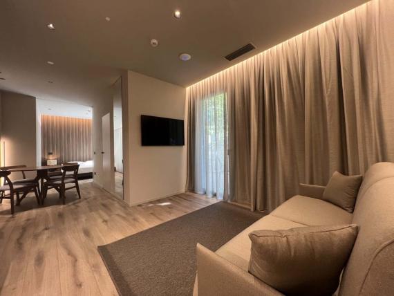 Soggiorno e zona pranzo negli Evangelisti Palace Suite & Apartments