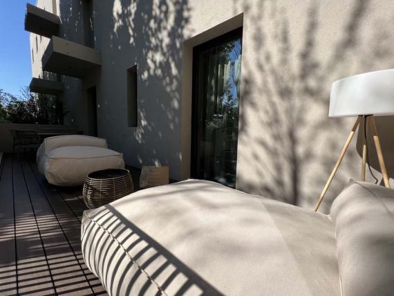 Area relax esterna con poltrone comode presso Evangelisti Palace Suite & Apartaments