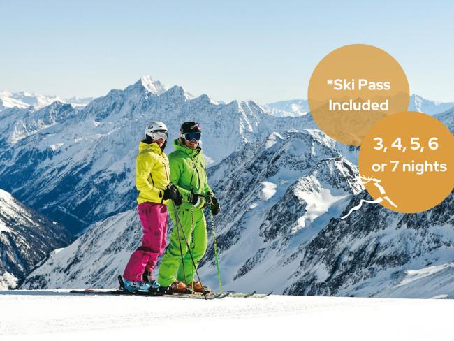 Hotel Jagdhof Pfurtscheller: Zwei Skifahrer vor verschneiter Bergkulisse, Skipass inklusive