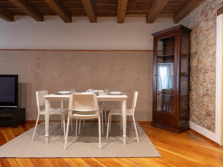 Dining room with set table at Hotel Touring Verona